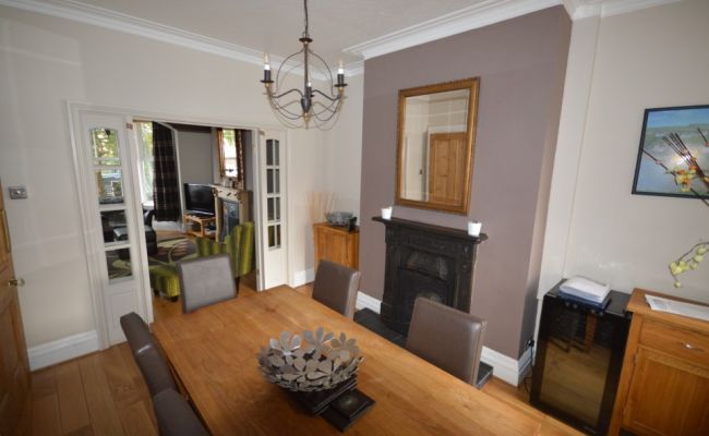 Dining room with a large table and chairs