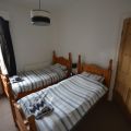 Two single beds in a bedroom