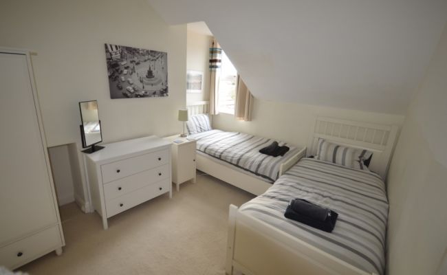 Two single beds in a bed room